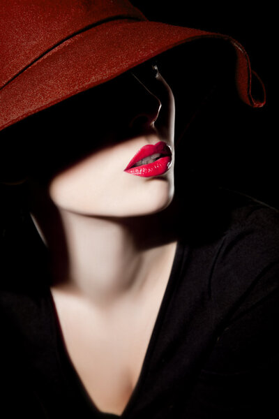 Beautiful woman with hat and red lips