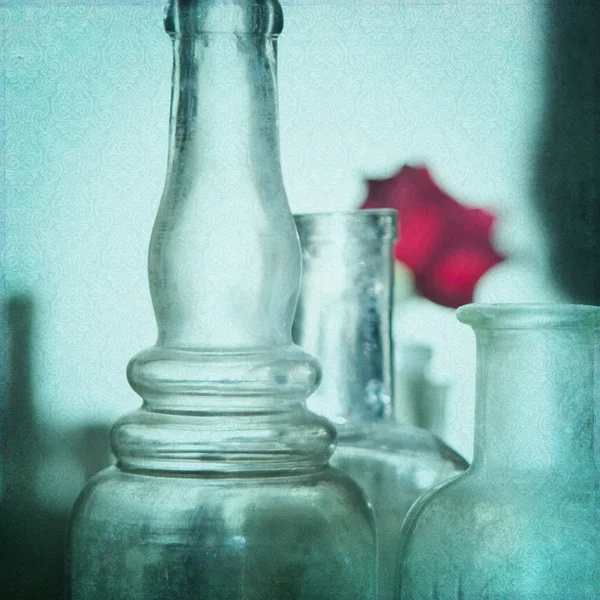 Shabby Chic Background with antique bottles — Stock Photo, Image