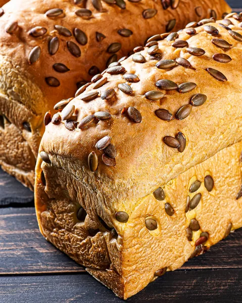 Sourdough bread made with pumpkin and topped with pumpkin seeds