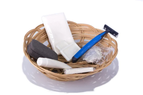 Hotel amenities kit in basket — Stock Photo, Image