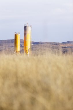 industrial deposits in a cornfield clipart