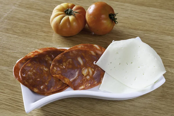 Fresh sausage on a plate — Stock Photo, Image