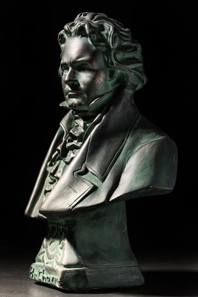 Beethoven sculpture on black background — Stock Photo, Image