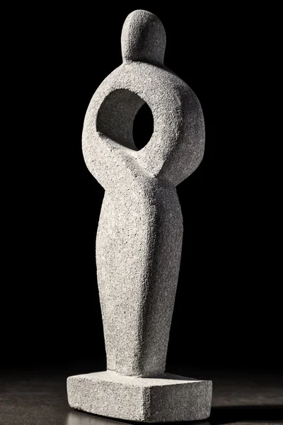 Abstract sculpture on black background — Stock Photo, Image