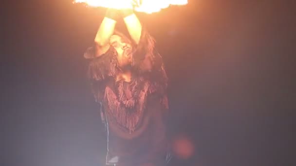 Bearded man in fire performance — Stock Video