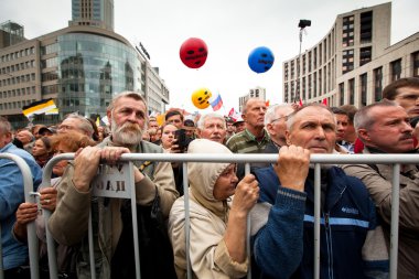 Opposition activists and supporters take part in an anti-Putin protest clipart