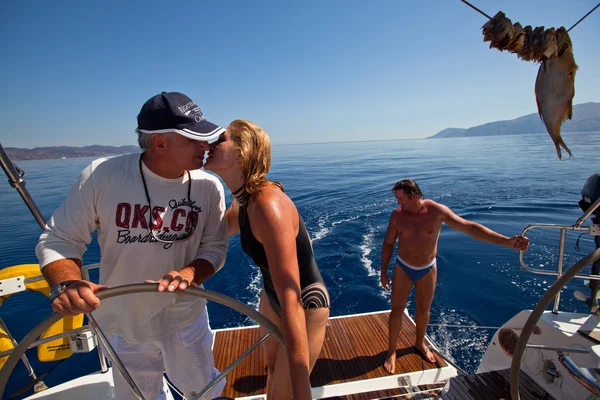 SARONIC GULF, GREECE - SEPTEMBER 23: Sailors participate in sailing regatta "Viva Greece 2012" on September 23, 2012 on Saronic Gulf, Greece. — Stock Photo, Image