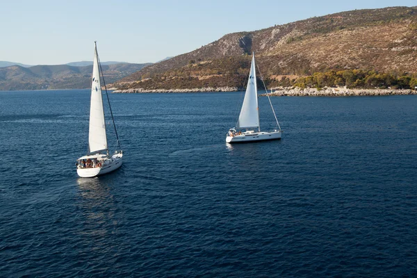 SARONIC GULF, GREECE - SEPTEMBER 23: Boats Competitors During of sailing regatta "Viva Greece 2012" on September 23, 2012 on Saronic Gulf, Greece — Stock Photo, Image