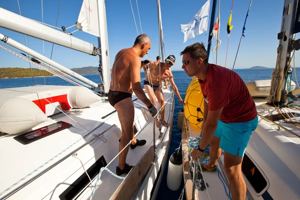 SARONIC GULF, GREECE - SEPTEMBER 23: Sailors participate in sailing regatta "Viva Greece 2012" on September 23, 2012 on Saronic Gulf, Greece Stock Picture