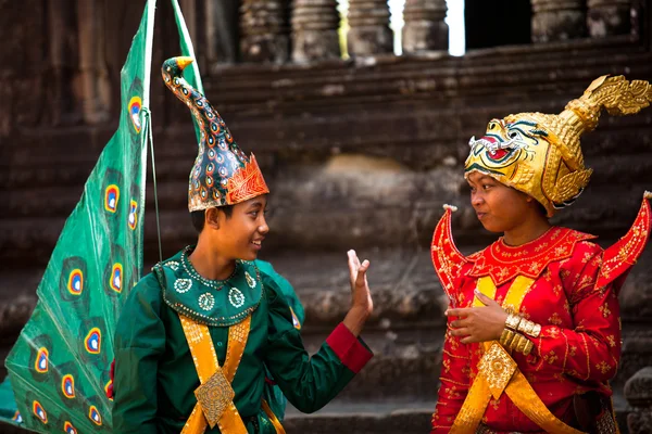 An unidentified cambodians in national dress poses for tourists in Angkor Wat Royalty Free Stock Photos