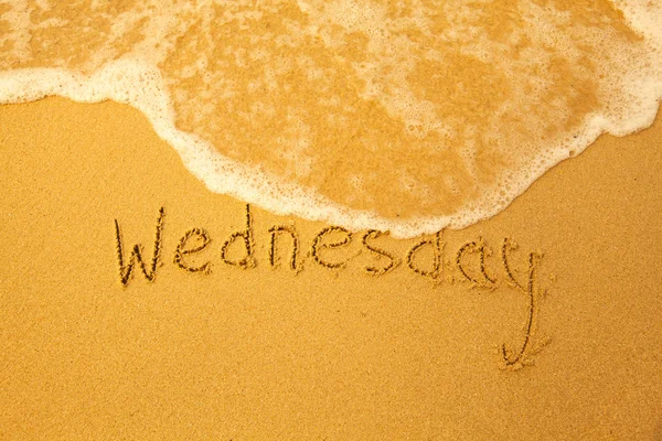 Wednesday written in sand — Stock Photo, Image