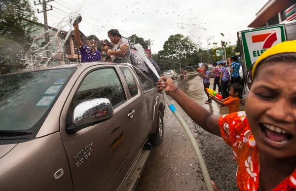 KO CHANG, THAILAND - APR 13: celebrated Songkran Festival, on 13 Apr 2013 on Ko Chang, Thailand. Songkran is celebrated in Thailand as the traditional New Year by throwing water at each other. — Stock Photo, Image