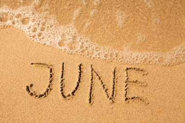 June - written in sand clipart