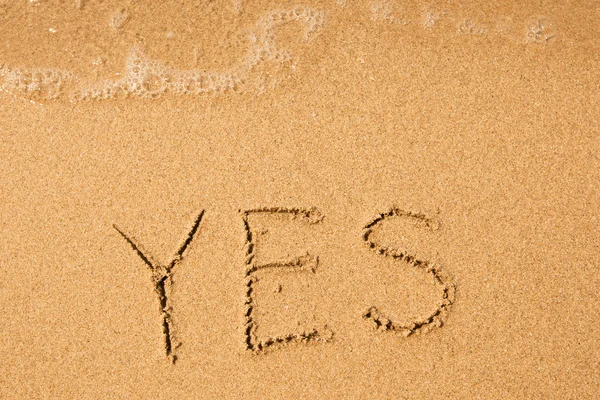 Yes - written in sand — Stock Photo, Image