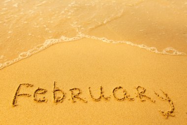 Şubat - kum beach doku, yumuşak dalga deniz üzerinde yazılı..