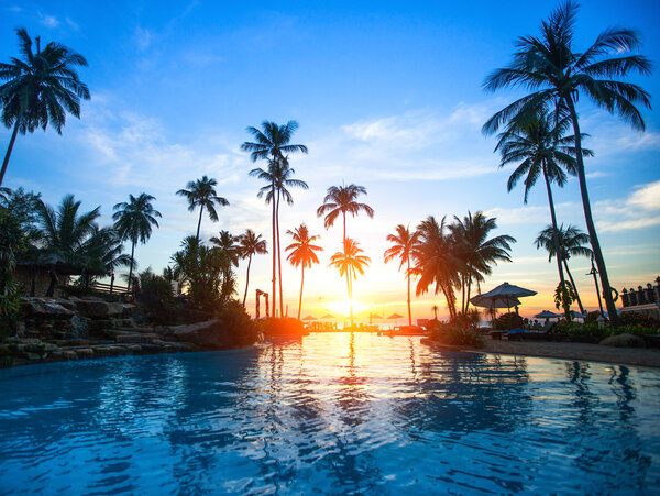 Beautiful sunset at a beach resort in tropics