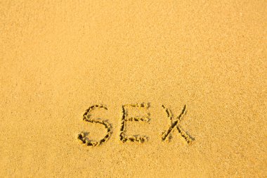 kum plaj doku üzerinde yazılı seks