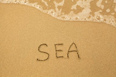 deniz - kum deniz sahilinde el tarafından yazıldı