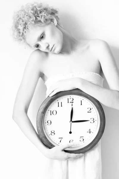 Scrawny girl with clock — Stock Photo, Image