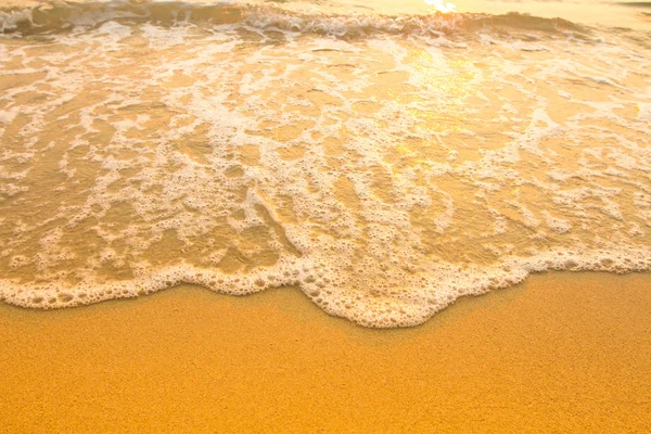 Spiaggia sabbia texture, morbida onda del mare . — Foto Stock