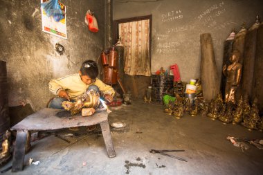 onun çalışma kimliği belirsiz Nepal tinman Atölyesi