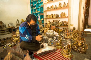 onun çalışma kimliği belirsiz Nepal tinman Atölyesi