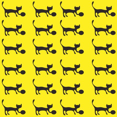 Sarı zemin üzerinde bir yay ile yavru kedi