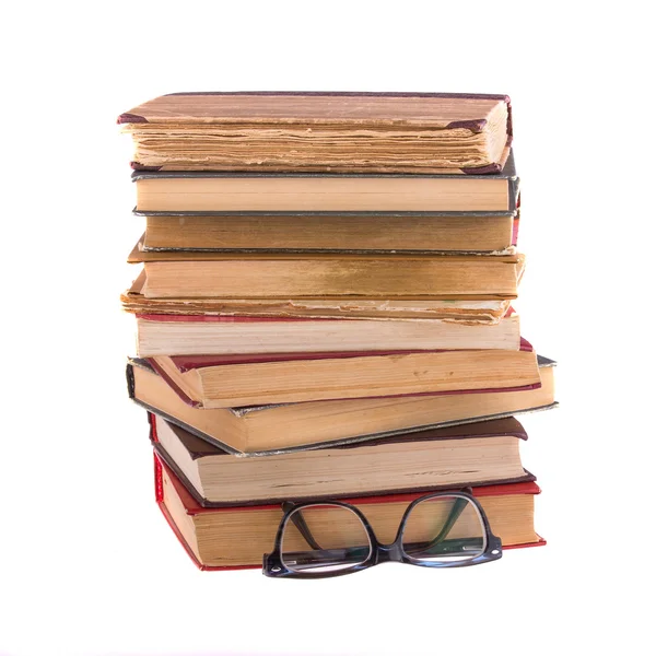 Stack of old books and spectacles — Stock Photo, Image