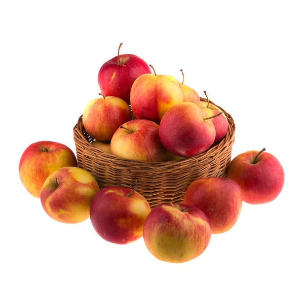 Apples in a wooden basket — Stock Photo, Image