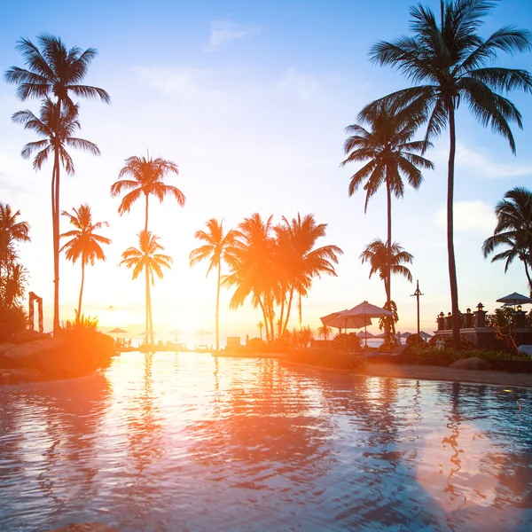 Sunset at a beach resort — Stock Photo, Image