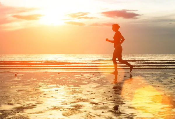 Silhouette de femme jogger — Photo