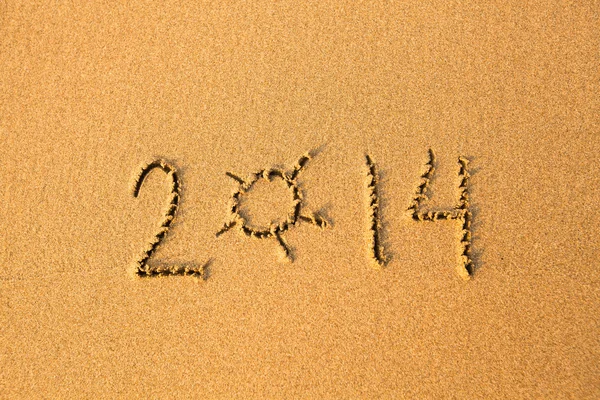 2014 - written in sand on beach texture Royalty Free Stock Images