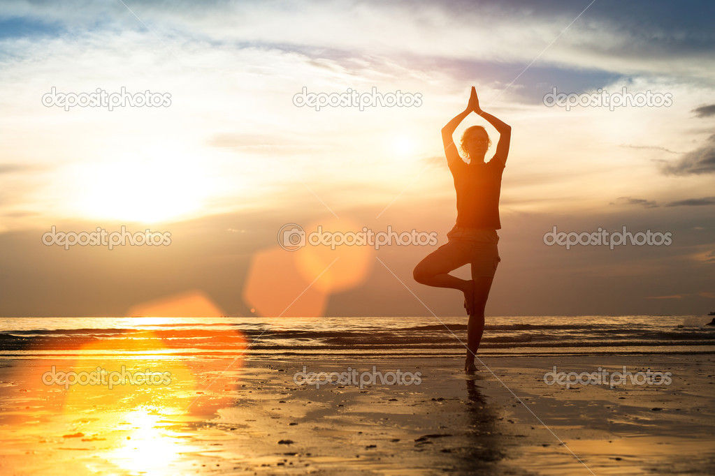 Woman exercise on the beach