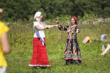 Participants during folk festival Ivan-Tea clipart