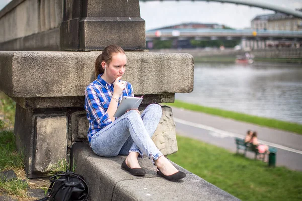 Teenage Girl Sits Tablet City Promenade — Stock Photo, Image