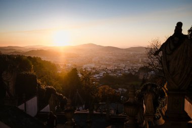 View from the church Bom Jesus do Monte stairway during amazing sunset light, Braga Portugal.