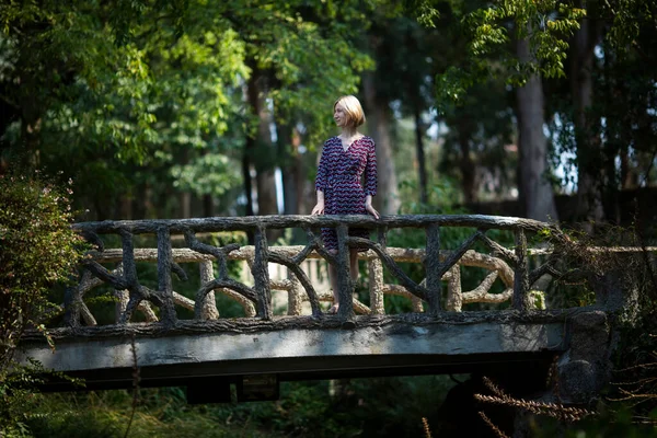 Young Woman Standing Bridge Old Portuguese Park — стоковое фото