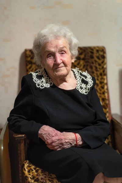 Old Woman Sits Armchair Her Home — Stock Photo, Image