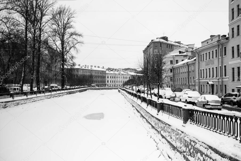 View of the Griboyedov Canal in the winter, St. Petersburg, Russia. Black and white photo. 