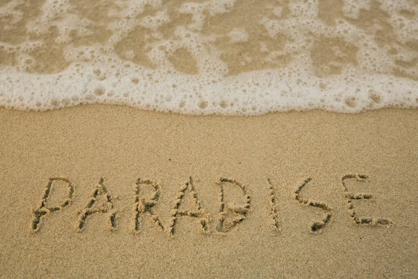 Paradise Γραμμένο Χέρι Στην Άμμο Της Παραλίας — Φωτογραφία Αρχείου