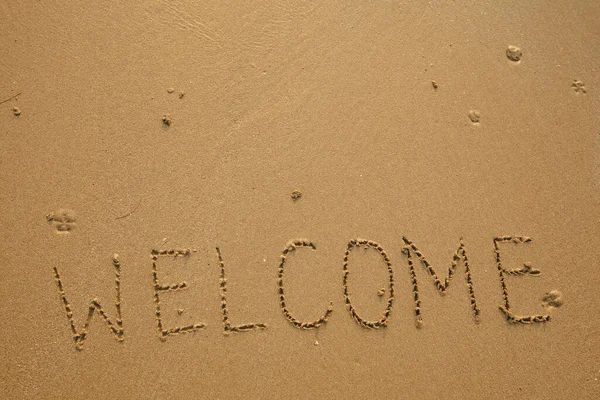 Hand Inscribed Welcome Texture Beach Sand 스톡 이미지