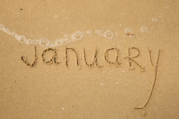 Gennaio Scritto Mano Sulla Sabbia Morbida Della Spiaggia — Foto Stock