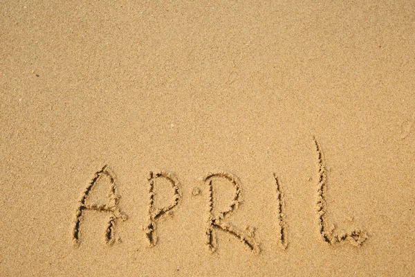 April Handwritten Soft Beach Sand — Stock Photo, Image