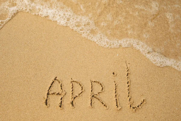 April Handwritten Soft Beach Sand — Stock Photo, Image