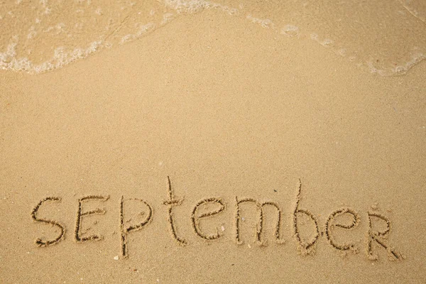 September Handwritten Soft Beach Sand Stock Image