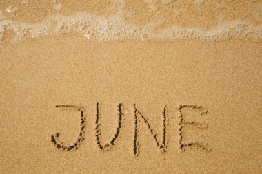 Haziran - yumuşak kumsalda el yazısı.