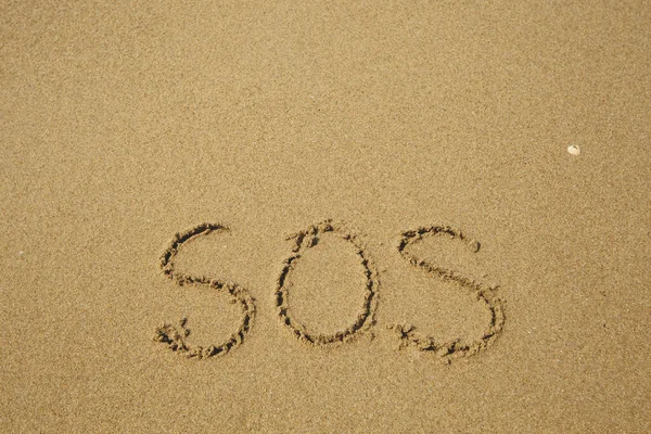 Sos Handwritten Soft Beach Sand — Stock Photo, Image