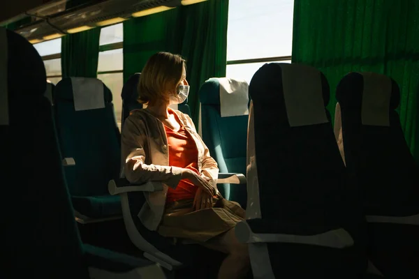 Woman Rides Empty Intercity Bus Royaltyfria Stockbilder
