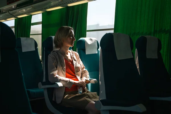 Woman Looks Out Window Intercity Bus — Stockfoto