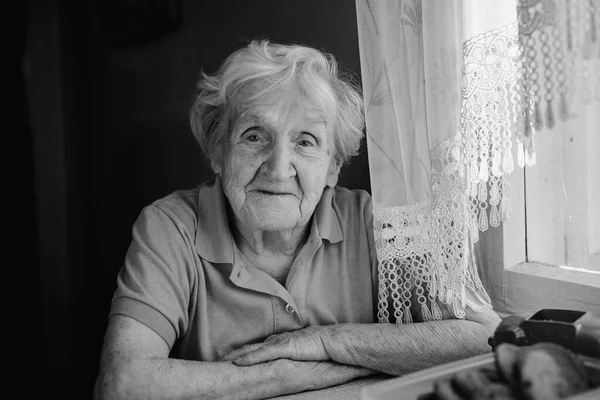 Portrait Old Woman Sitting Table Home — Stok fotoğraf